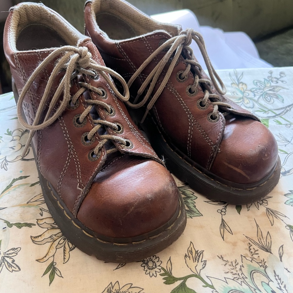 Dr Marten’s brown leather shoes